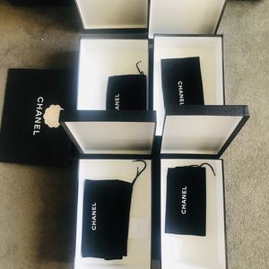 2 empty Chanel shoe boxes.